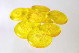 yellow sharing stones with cremation ash