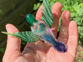 Dichroic glass hummingbird with cremation ash