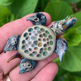 Memorial sea turtle with cremation ash
