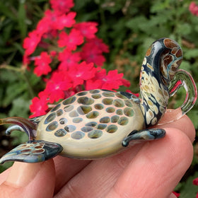 Memorial sea turtle with cremation ash