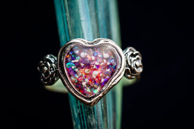 silver heart with cremation ashes