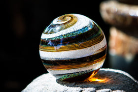 brown paperweight with cremains