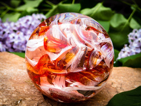 Ashes in glass orb for rememberance of people and pets