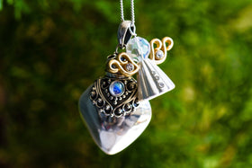 silver-heart-and-angel-pendant