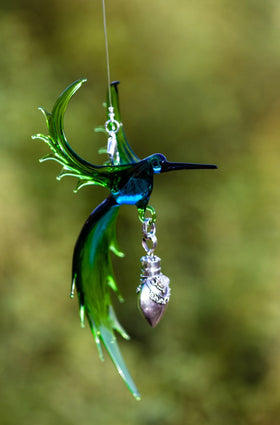 bird-of-paridise-with-silver-keepsake-for-ashes