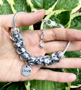 BLACK AND WHITE Bracelet with 8 Cremation Ash Beads