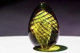 glass-spiral-cremation-urn-with-infused-ash-yellow