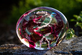 glass paperweight with cremains