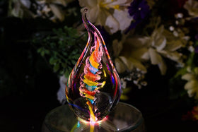 Illuminated Tri-Color Glass Flame Paperweight with Ashes