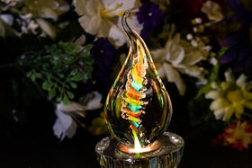 Illuminated Tri-Color Glass Flame Paperweight with Ashes