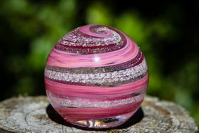 Pink paperweight with cremains