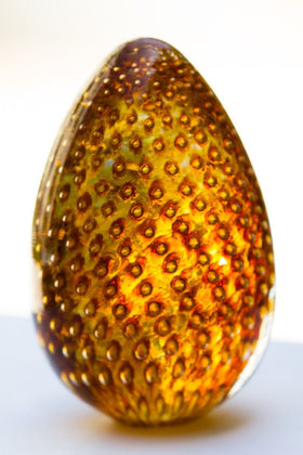 Solid Glass Cremation Urn with Infused Cremains - Topaz Bubble Egg