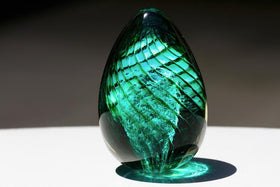 glass-spiral-cremation-urn-with-infused-ash-teal