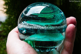 tranquil-swirl-glass-paperweight-with-ash
