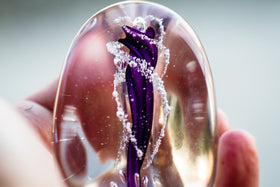 twisted-color-helix-stone-with-cremation-ashes-in-glass