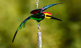 yellow-headed-bird-with-silver-keepsake-for-ashes