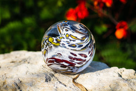 yellow-and-red-cat-eye-paperweight-with-infused-cremation-ash